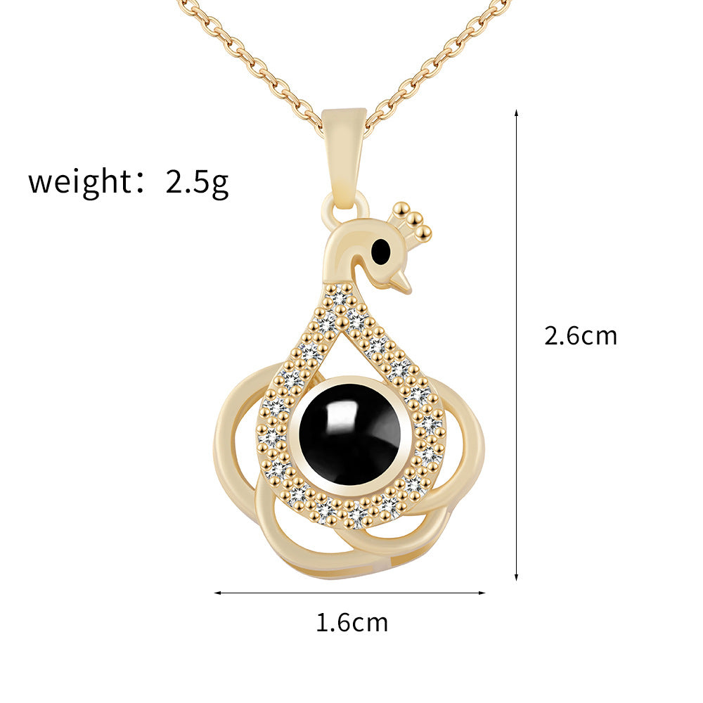 PX01 - Eternal Elegance Peacock Photo Projection Necklace – Gold & Silver