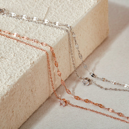 GP16 🌟 Delicate Dual Chain Bracelet with Solitaire Zirconia – Rose Gold & Silver