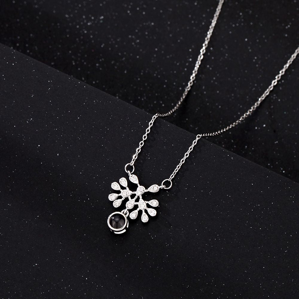 PX12 - Hidden Photo Teardrop Necklace – A Touch of Emotion, Worn with Elegance