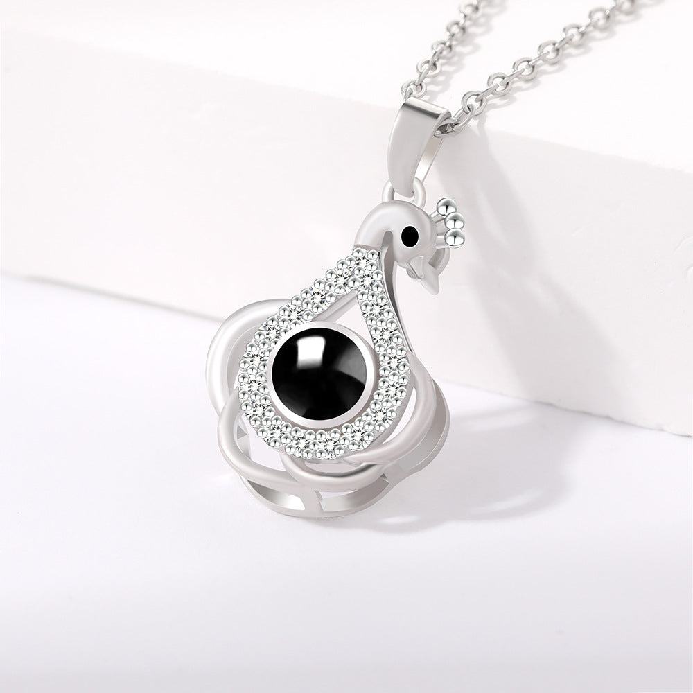 PX01 💌 Eternal Elegance Peacock Photo Projection Necklace – Gold & Silver