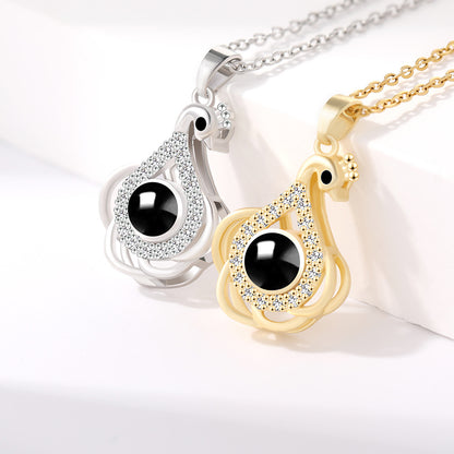 PX01 💌 Eternal Elegance Peacock Photo Projection Necklace – Gold & Silver