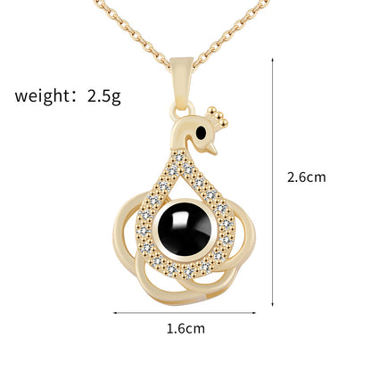 PX01 - Eternal Elegance Peacock Photo Projection Necklace – Gold & Silver