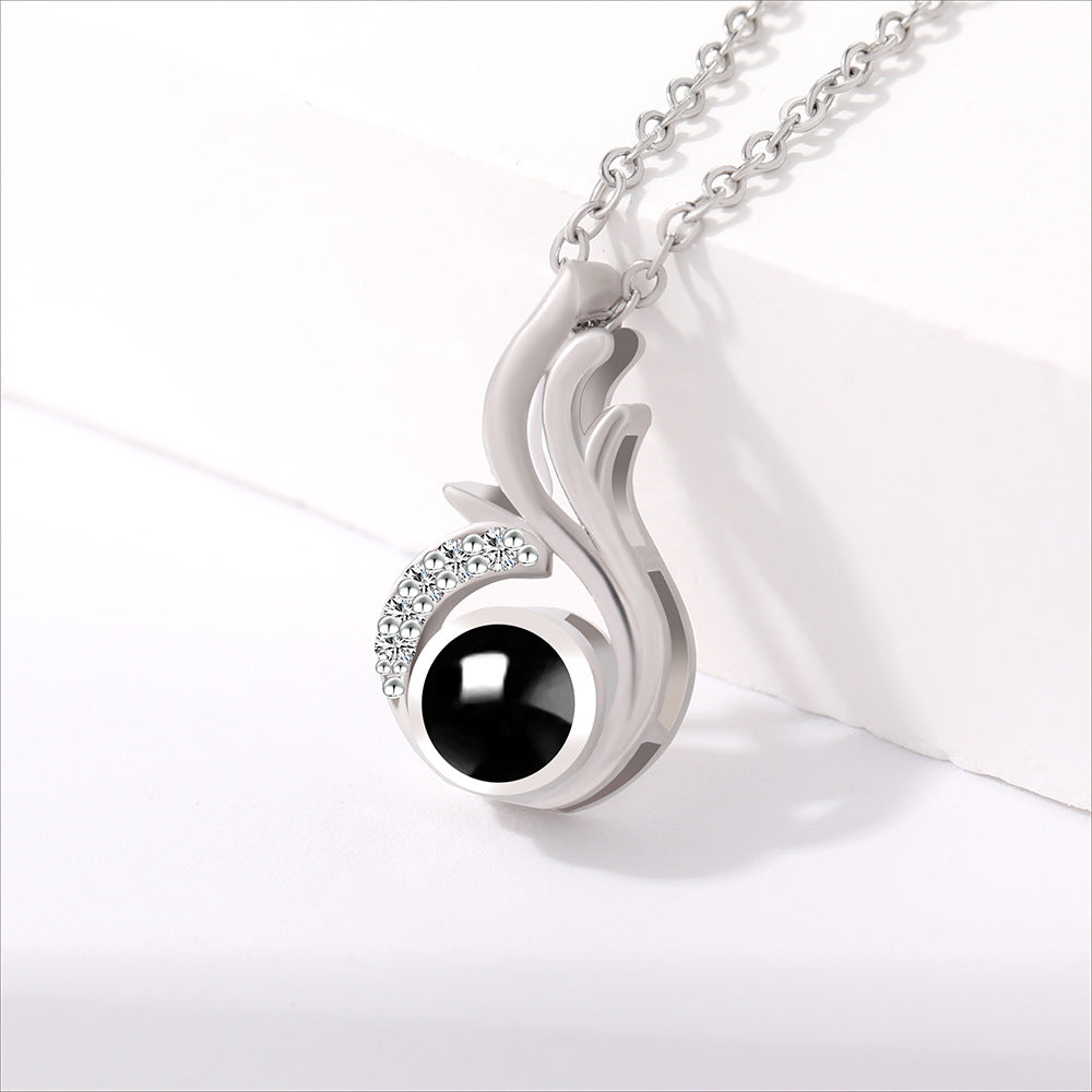 PX20 💌 Shooting Flame Photo Projection Necklace – Ignite Every Memory