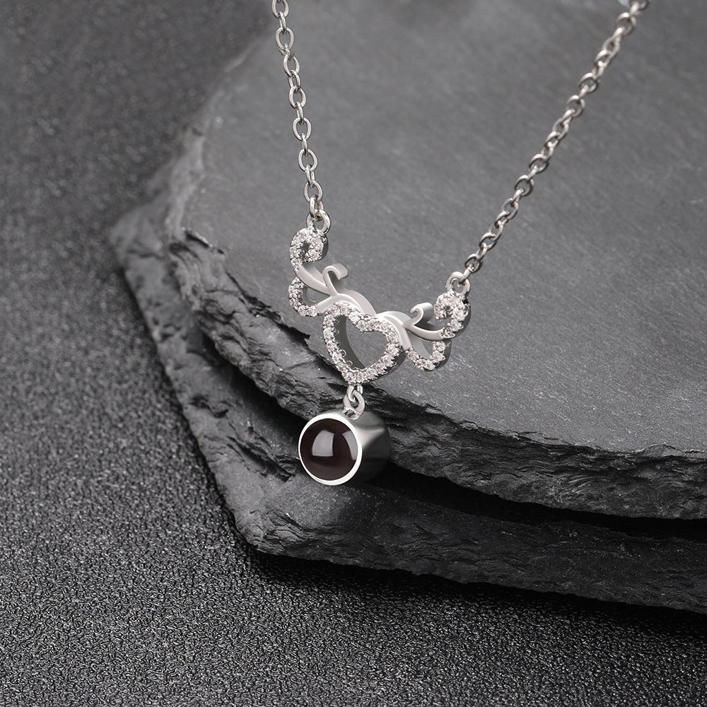 PX38 Antler Heart Projection Necklace – A Symbol of Eternal Bond