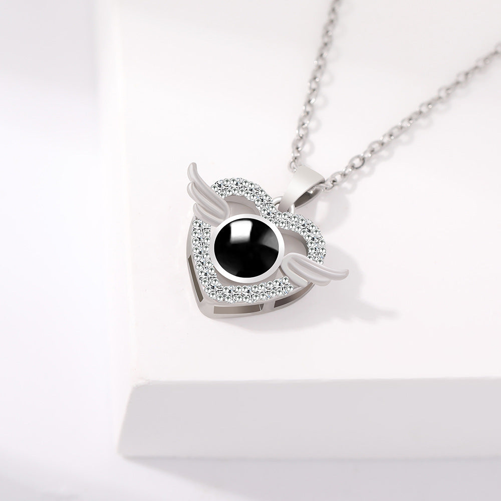PX42 Angel Wings Heart Projection Necklace – A Keepsake of Eternal Love