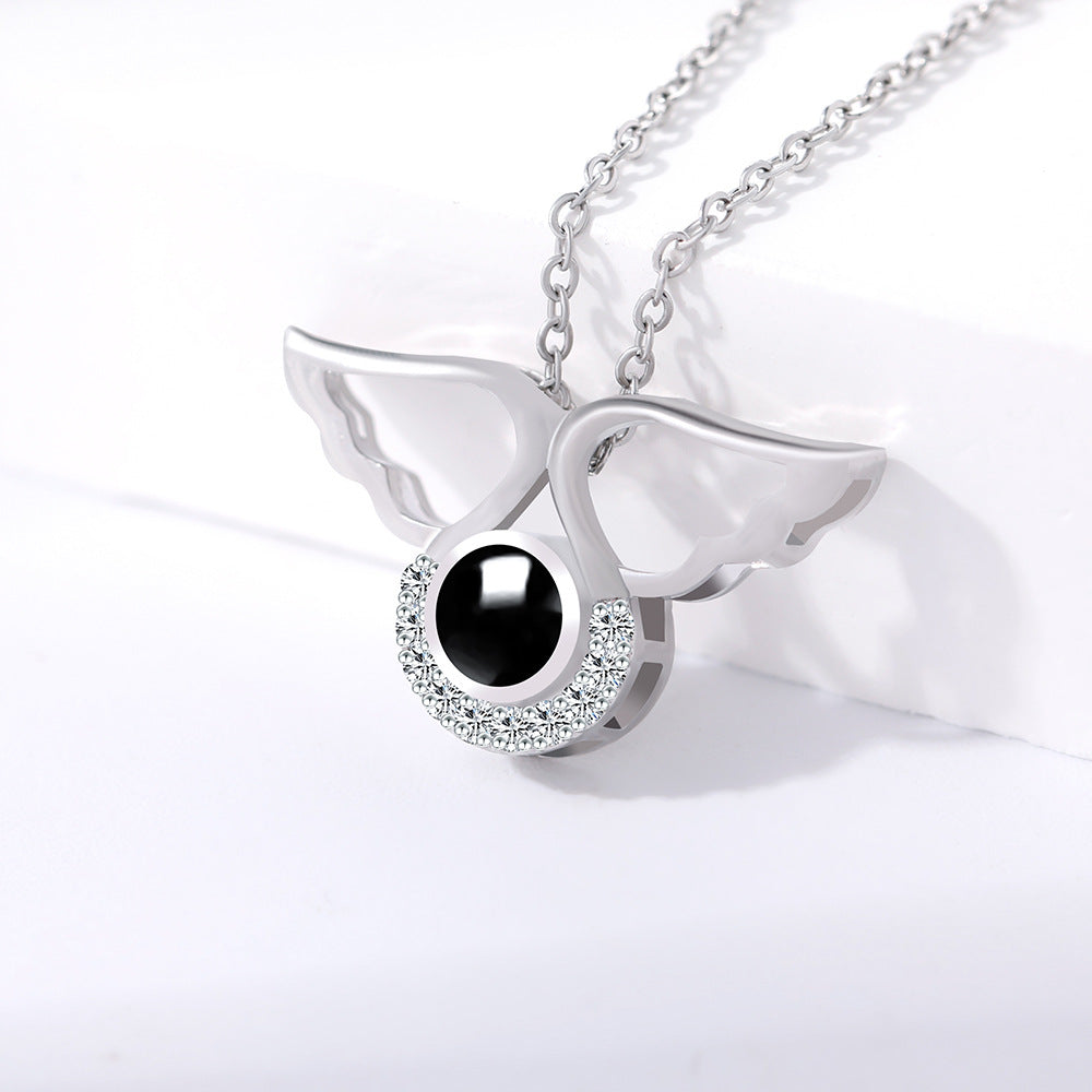 PX48 💌 Carry Love with You Always – Angel Wing Projection Necklace